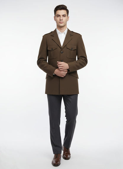Man wearing a brown jacket and dark pants on a white background